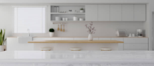 istock Elegance marble kitchen countertop over blurred modern luxury kitchen space 1364125220