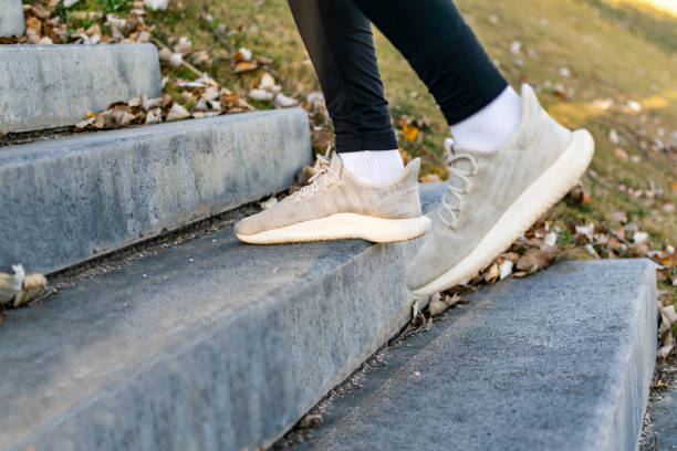 istock young man climbing stairs 1364126850