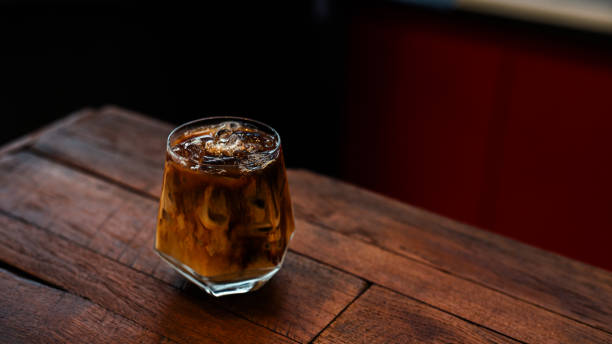 istock Glass of coffee on the table 1364128243