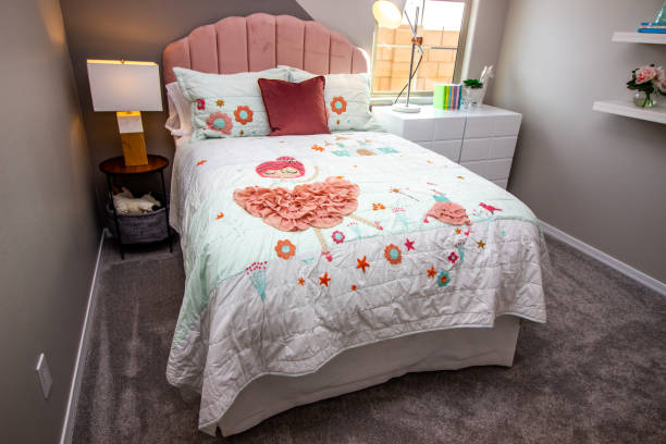istock Girl's Bedroom With Pink Headboard 1364128308