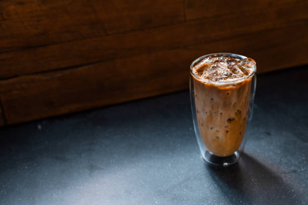 istock Glass of coffee on the table 1364134710