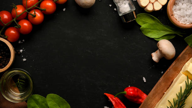 istock Healthy fresh vegetables background with a copy space on black background. 1364135513