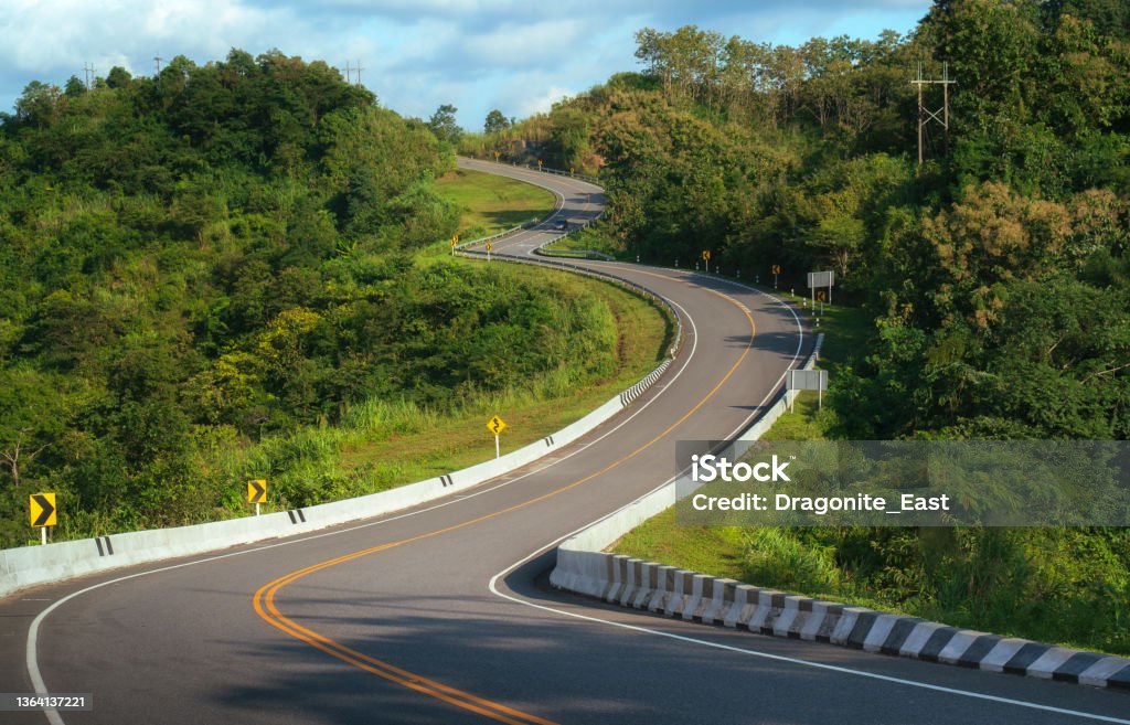 Beautiful curvy road way from Pua District to Bor Kluea District, Nan province, Thailand Hill Stock Photo