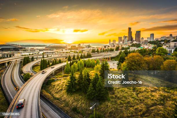Seattle Skylines And Interstate Freeways Converge At Sunset Seattle Washington Usa Stock Photo - Download Image Now