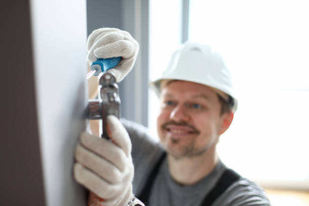 istock Happy repairman in uniform 1364143520