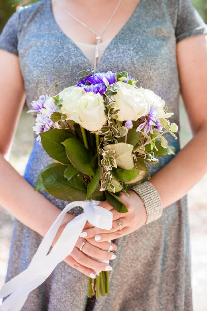 istock Bouquet with roses, chrysanthemums and white deren leaves 1364146674