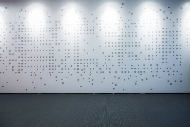 White woven light illuminates the interior geometry building wall