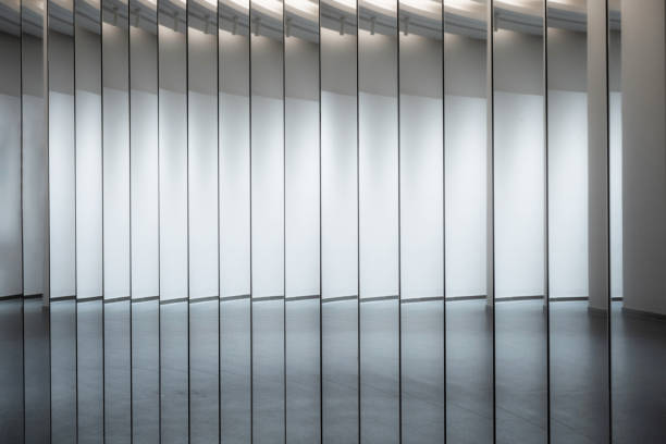 istock The mirrors of the bright, clean, empty interior buildings reflect 1364147588