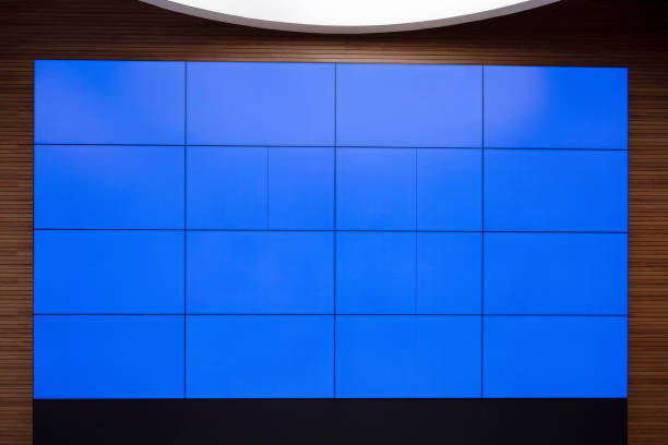 Clean and empty, bright interior blue geometric squares decorate the walls