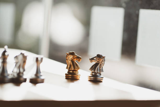 istock Battle concept and business plan, horse chess face to face 1364149203