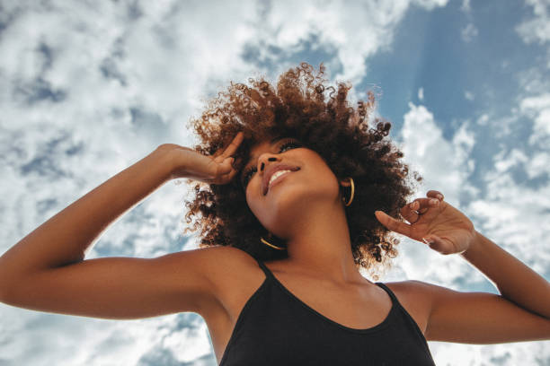 istock Pretty young afro woman 1364149204