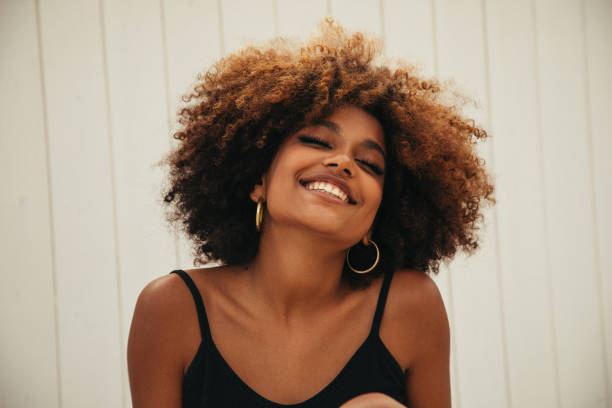 istock Pretty young afro woman 1364149240