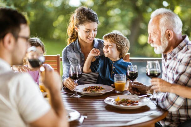 istock Enjoying in family's lunch on a balcony! 1364152437