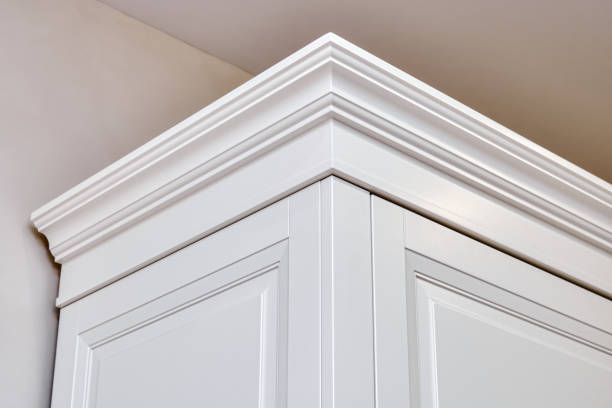 istock Elegant white vintage wardrobe cabinet with crown moldings 1364153969