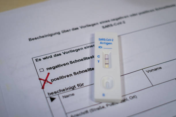istock a positive corona covid-19 rapid test is on a test form 1364155039