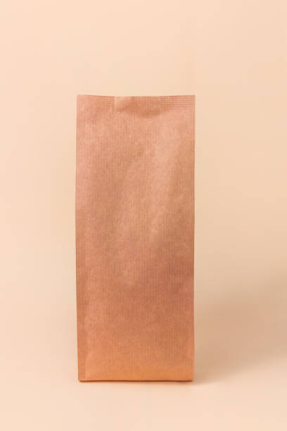 istock Sachet pouch bag mockup neutral beige background monochrome. Merchandise packaging Takeaway food snack delivery purchase 1364158482