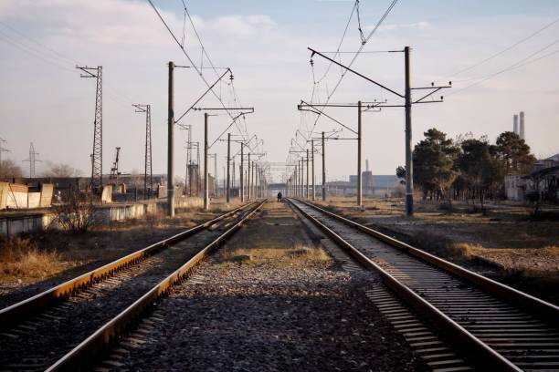 istock Evening scene with a railway. Railway going to infinity. 1364162897