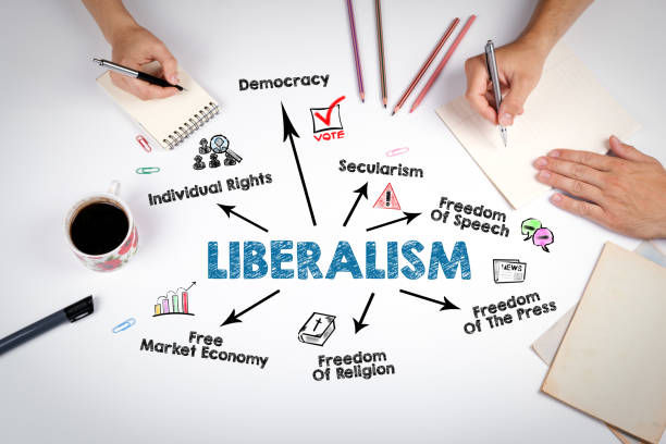 istock Liberalism. Illustrative graphic representation.. The meeting at the white office table 1364164514
