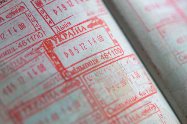 istock Ukrainian border stamps in the passport. 1364167572