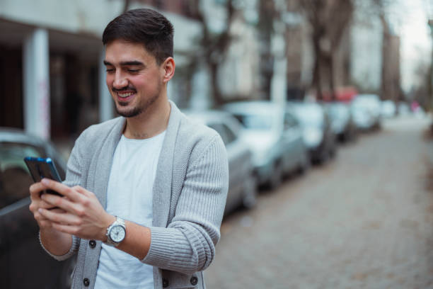 istock Young man using mobile phone, shopping online. 1364170715