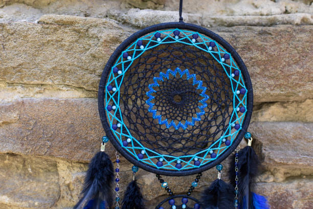 istock Handmade dream catcher with feathers threads and beads rope hanging 1364171973