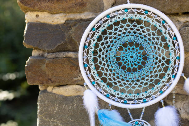 Handmade dream catcher with feathers threads and beads rope hanging