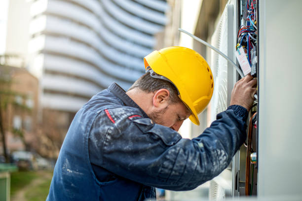 istock Air conditioner technician services outdoor AC unit and the Gas Generator 1364172822