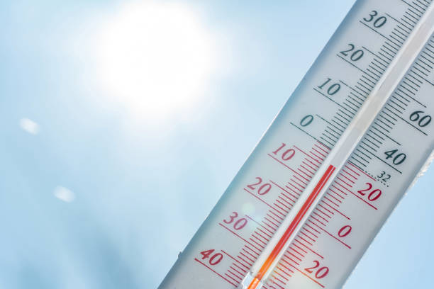 istock Thermometer in winter in the cold on snow and analyzes low negative air temperatures in clear sunny weather.Meteorological conditions and environmental analysis.Climate change on earth.Northern region 1364174931