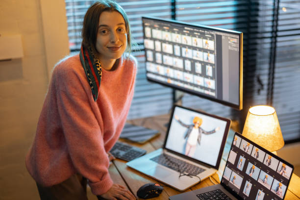 istock Photographer editing photos at home office 1364175275