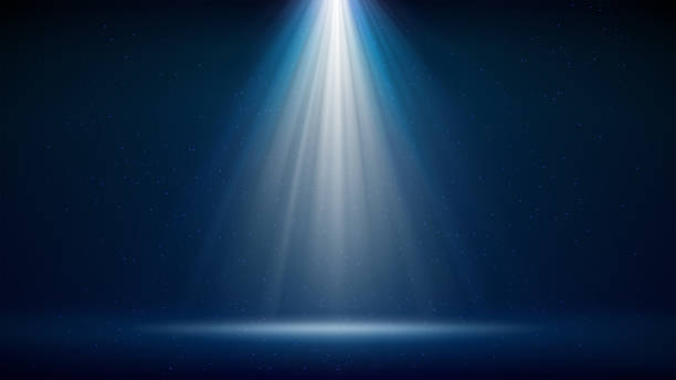 Spotlight background. Illuminated blue stage. Divine radiance. Backdrop for displaying products. Bright beams of spotlights, shimmering glittering particles, a spot of light. Vector illustration Spotlight background. Illuminated blue stage. Divine radiance. Backdrop for displaying products. Bright beams of spotlights, shimmering glittering particles, a spot of light. Vector illustration stage lights stock illustrations