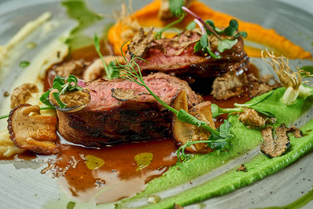 istock Medium rare beef steak. Selective focus, close-up. Noise grain in post-production 1364183363