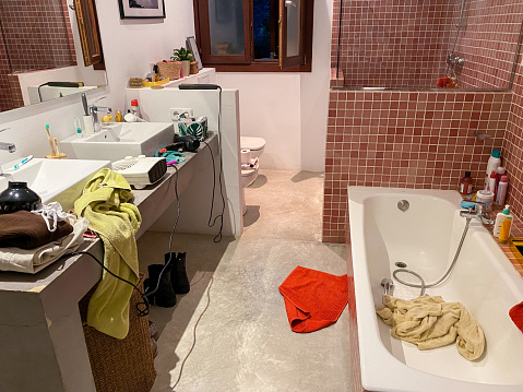 chaos and disorder in the bathroom at home in the morning due to the rush to be on time