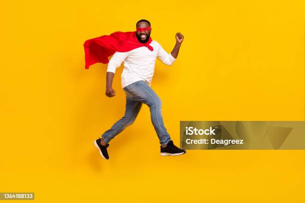 Full Length Profile Photo Of Crazy Cheerful Guy Flight Travel Toothy Smile Isolated On Yellow Color Background Stock Photo - Download Image Now
