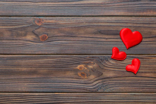 istock Valentine day background with red hearts, top view with copy space 1364191501