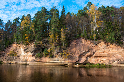 Devils rock and cave by the shores of the River Gauja, Sigulda, Latvia