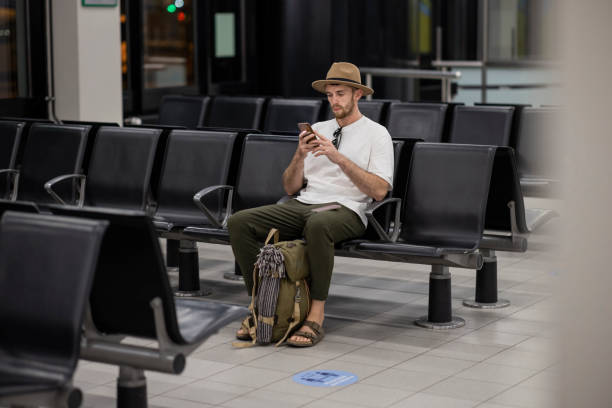 istock Playing Mobile Games to Pass the Time 1364199383