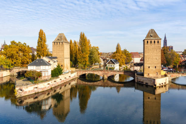 La Petite France with bridge over river Ill water tower Alsace in Strasbourg, France La Petite France with bridge over river Ill water tower Alsace in Strasbourg, France city petite france strasbourg stock pictures, royalty-free photos & images