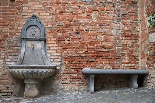 Ancient Fountain in a Medieval Village in Italy