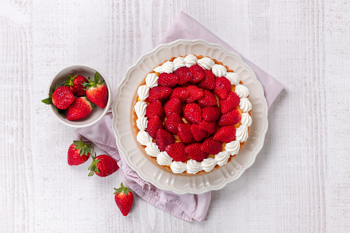 Strawberry tarts full of spring fresh strawberries and cream.