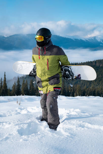 istock man snowboarder portrait carpathian mountains on background 1364209731