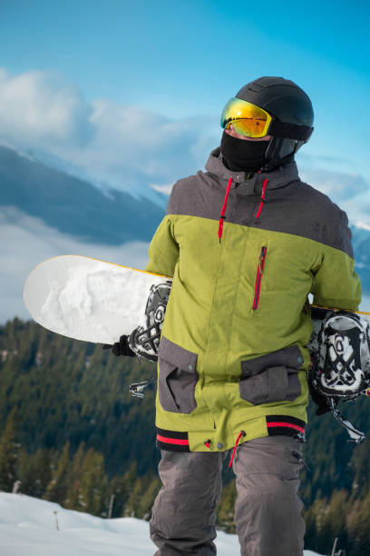 istock man snowboarder portrait carpathian mountains on background 1364209732