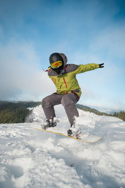 istock man snowboarder portrait carpathian mountains on background 1364209734