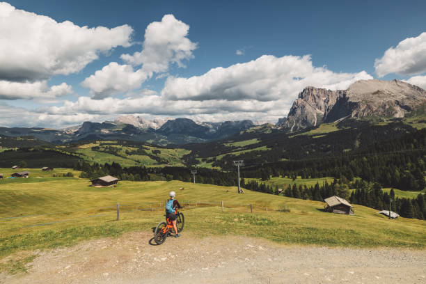 istock Mountain biker on a ski slope in Dolomites in summer 1364210067