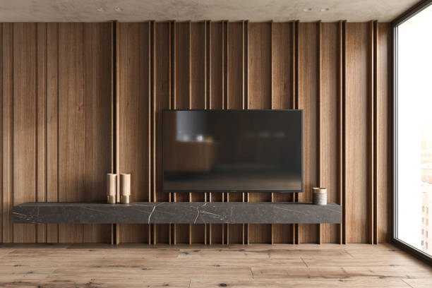smart tv mounted hang on wooden panels wall in living room with shelf and decor in modern interior. mock up 3d render illustration. - 3d wall panel 個照片及圖片檔