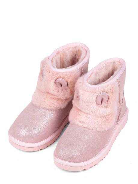 istock Pink winter woman's boots with fur on a white background 1364210381