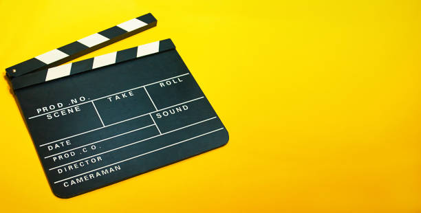 A clapperboard, symbol of filmmaking and video production. Professional type of equipment, used on films to assist in synchronizing of picture and sound movie sound clips stock pictures, royalty-free photos & images