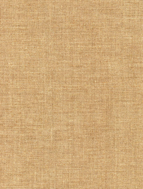 istock Light brown color rough fabric texture for background 1364211304