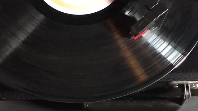 Top View needle on spinning vinyl record