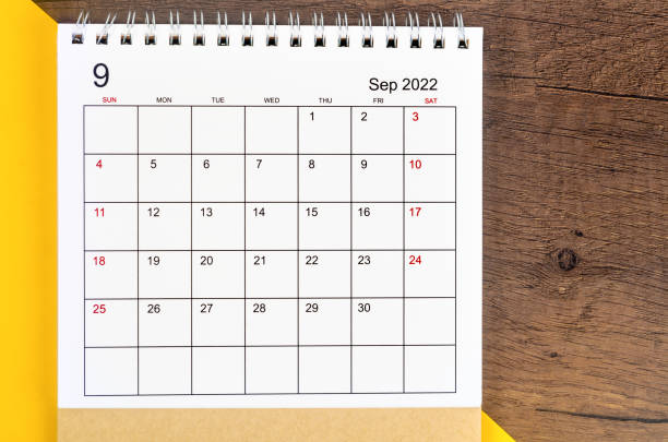 istock September 2022 desk calendar on wooden background. 1364217819