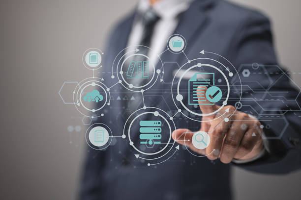 istock Concept of ERP and document management using icons on a virtual screen 1364217833